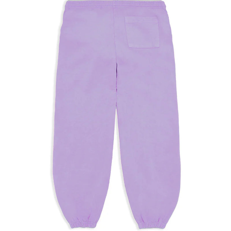 Unisex lavender Sp5der sweatpants made from 100% cotton, shown from the back. Features an elastic waistband and cuffs, a single upper-right patch pocket, relaxed fit, plus vertical logo and star details for streetwear style.