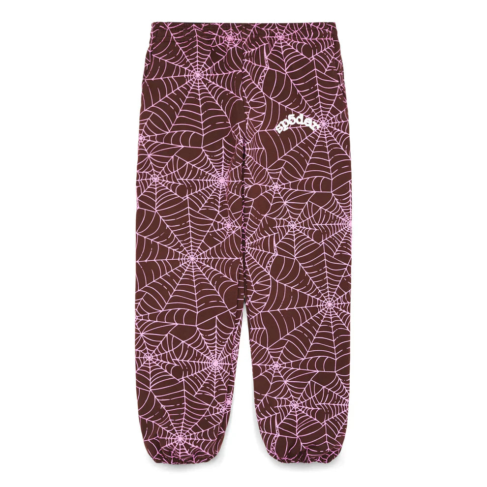 100% Cotton Sp5der Sweatpants – Unisex brown jogger pants with an all-over pink spider web print, small white logo, and a relaxed fit. Features elastic waistband and cuffs for comfort and streetwear style.