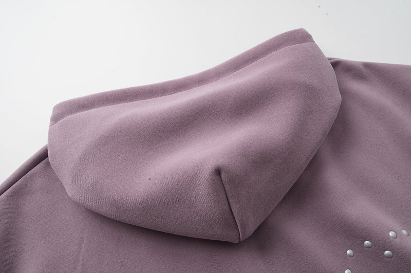 Close-up of lavender hoodie hood seam and shoulder