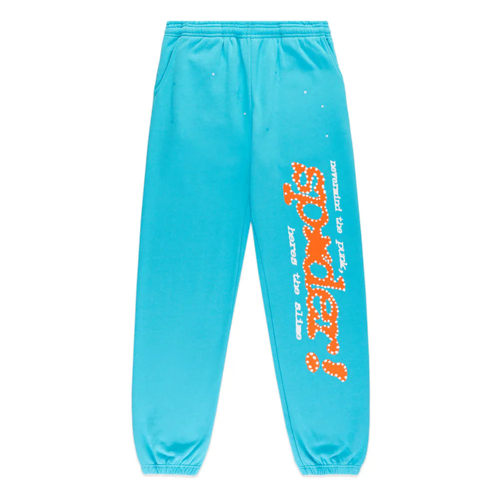 Unisex teal 100% cotton Sp5der jogger sweatpants featuring a relaxed fit, elastic waistband and cuffs, side pockets, and an eye-catching orange logo print along the right leg—perfect for standout street style.