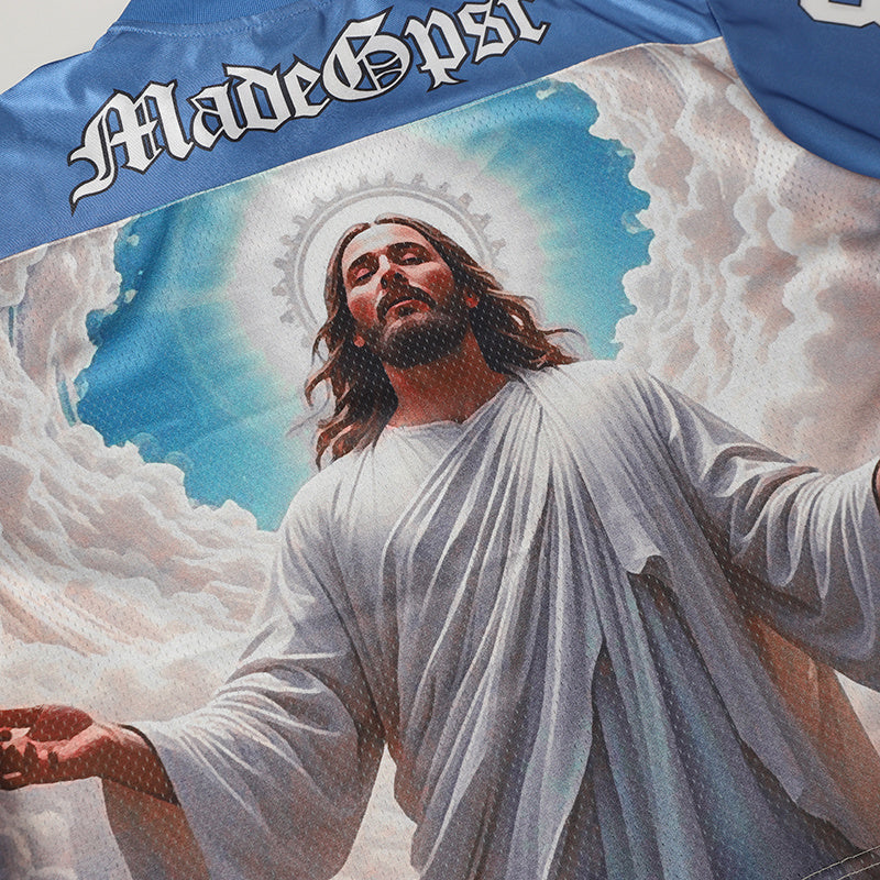 Blue football jersey with sacred Jesus graphic and Made Gpsr logo, featuring clouds and a haloed figure on the front