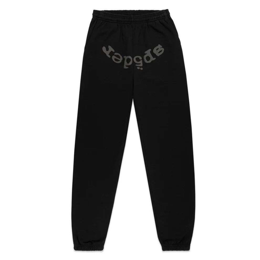 The Sp5der Black Tonal Logo Sweatpants are unisex 100% cotton streetwear joggers featuring an elastic waistband, cuffs, and a bold tonal Sp5der logo across the front for a standout look and classic comfort.
