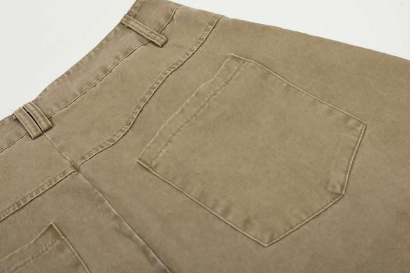 Close-up of back pocket on khaki cotton pants