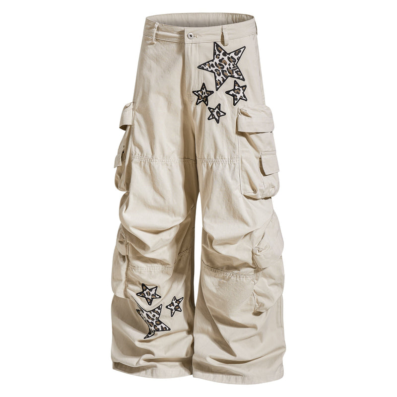 Beige cargo pants front view with leopard star patches and wide legs