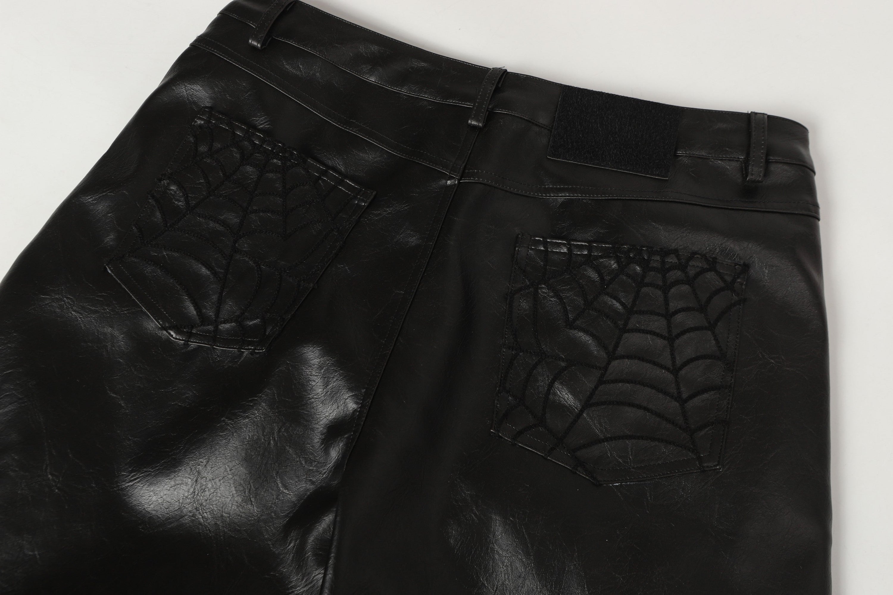 Spider-Web Embossed Faux Leather Wide-Leg Pants | Omirad