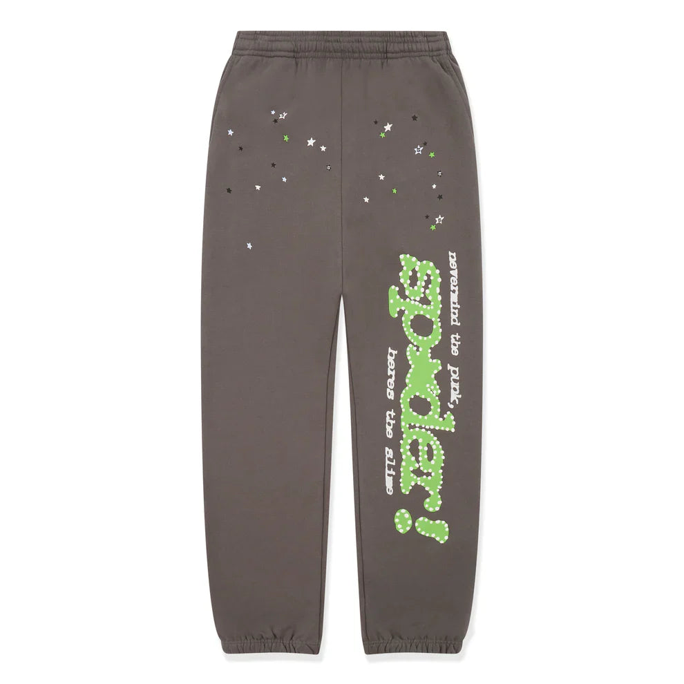 Unisex Sp5der Sweatpants in dark grey cotton showcase a green side logo and star print, combining comfort with bold streetwear style.