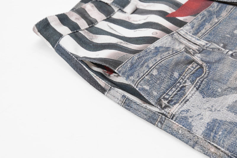 Side hem close-up showing layered denim and striped inner panel