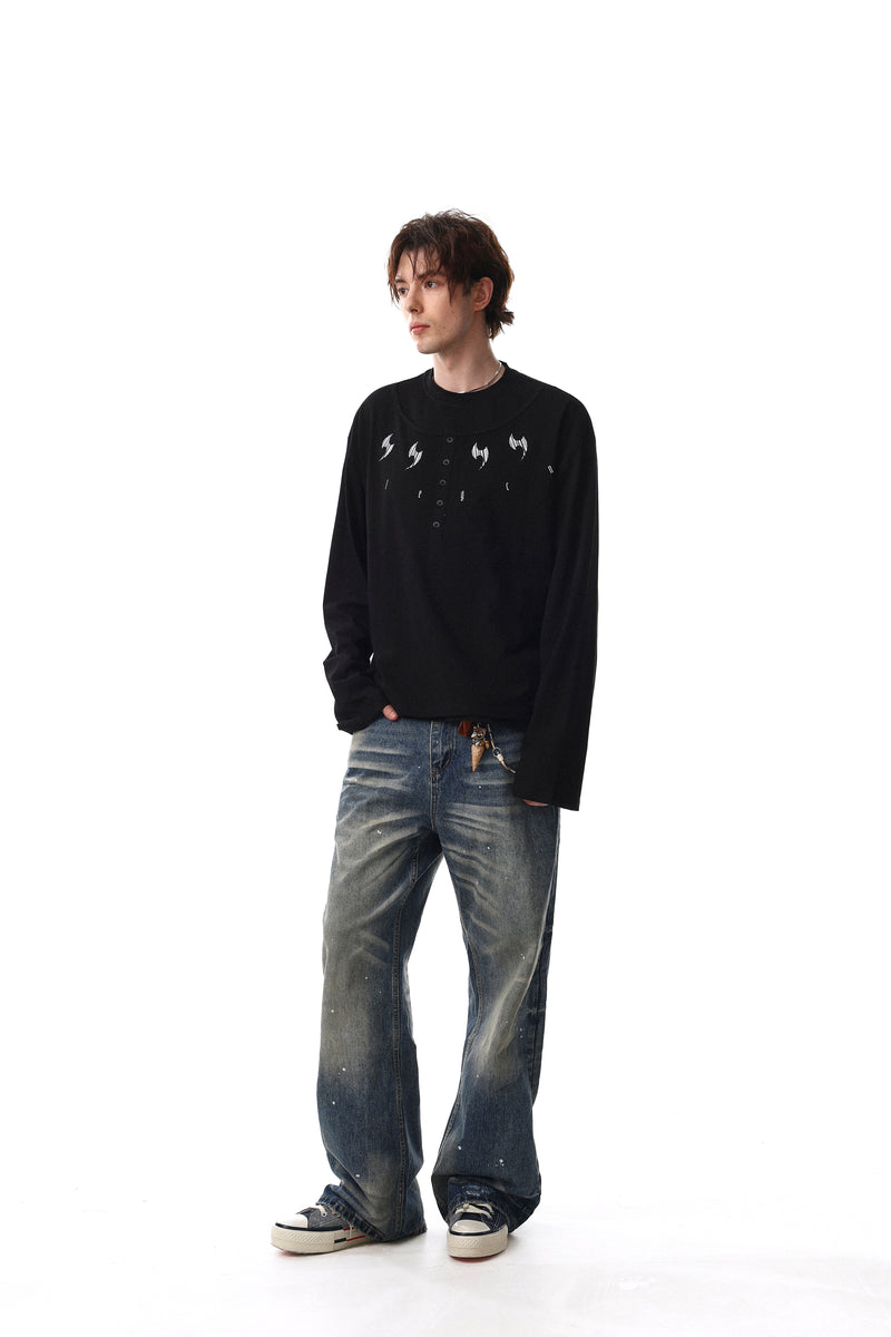 Black henley tee worn by model, full-body front view with long sleeves