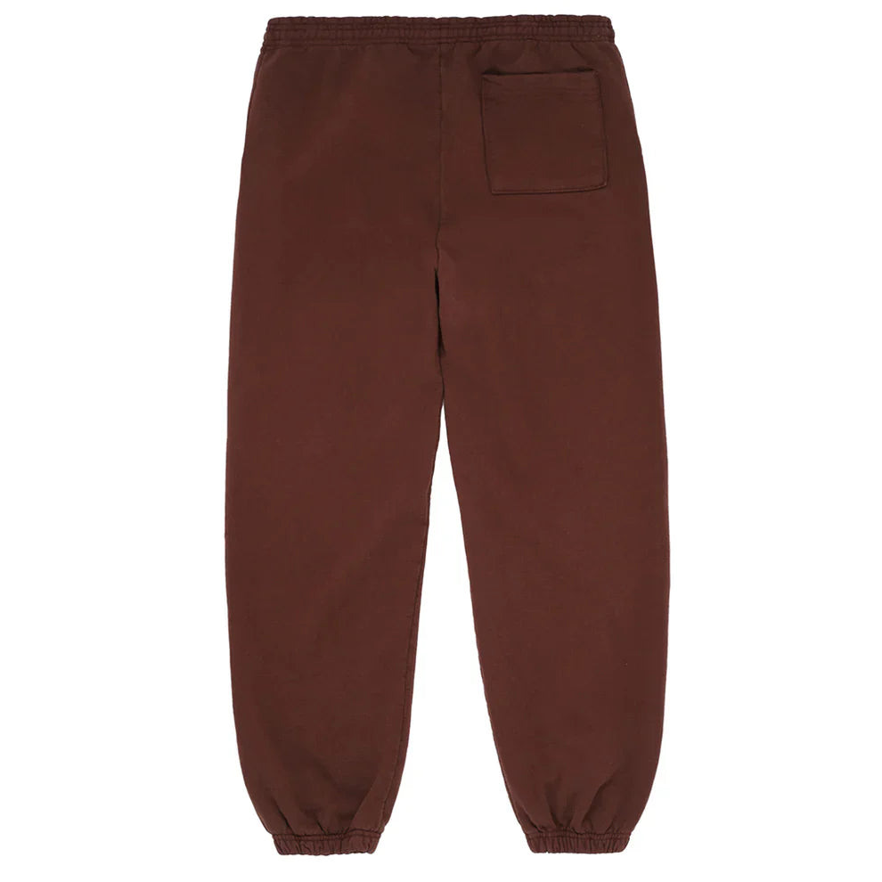 Unisex brown Sp5der sweatpants with a pink front logo and star print, crafted from cotton and designed with an elastic waistband and cuffs—ideal streetwear for any fan.