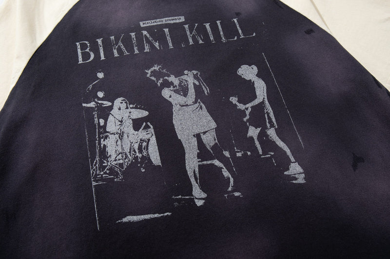 Black vintage raglan tee with distressed Bikini Kill concert graphic and grunge band print
