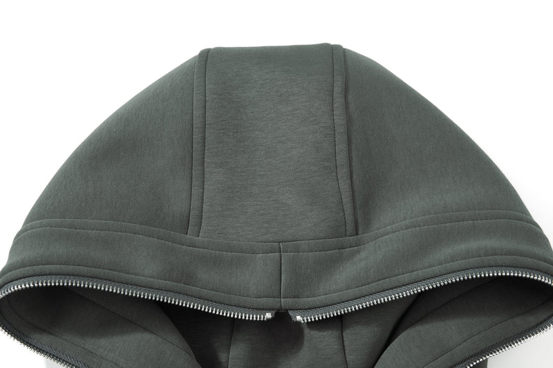 Close-up of dark green hoodie hood and zipper opening