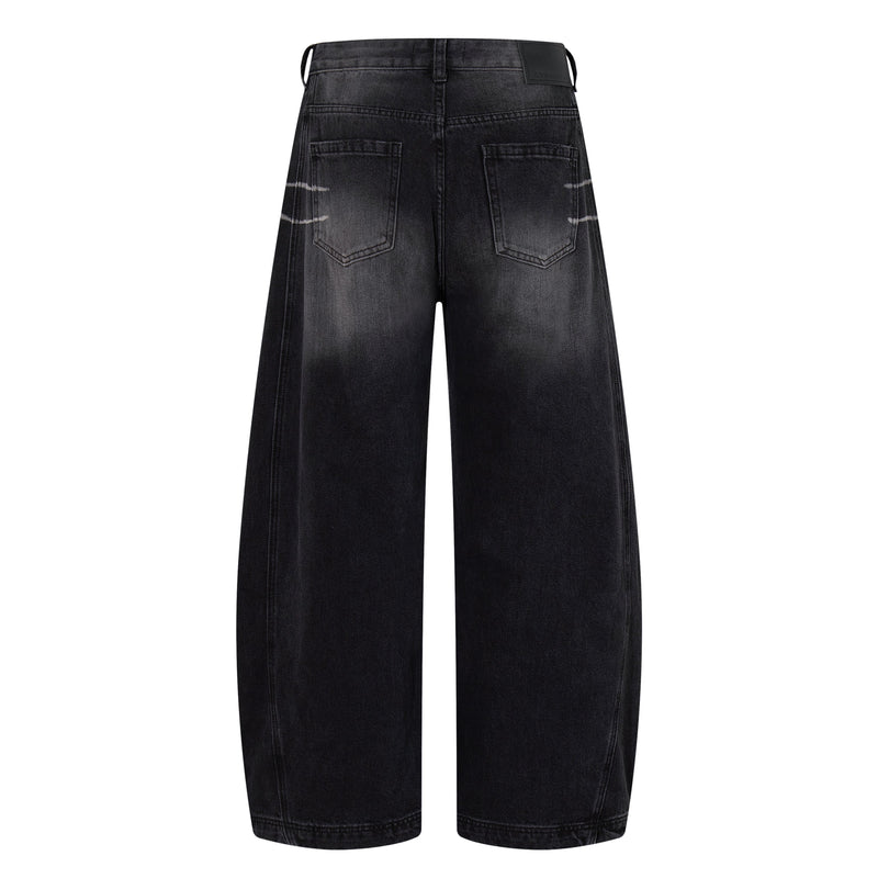 Back view of washed black wide-leg jeans with five-pocket styling and faded scratch marks at the hips