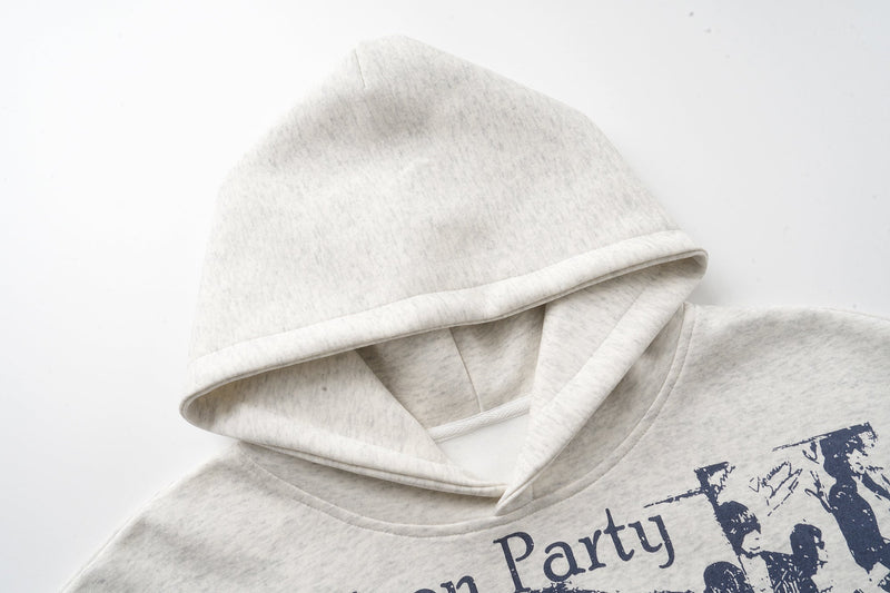 Close-up of heather gray hoodie hood and neckline with printed graphic at shoulder