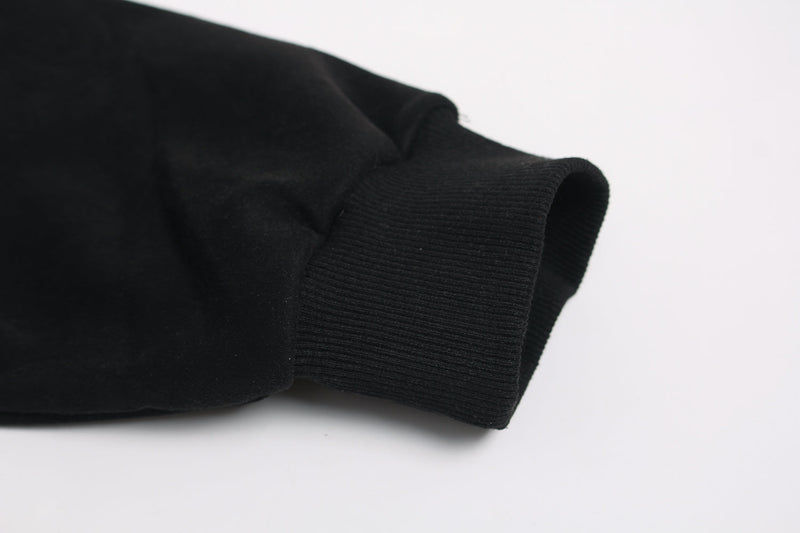 Black hoodie ribbed cuff close-up