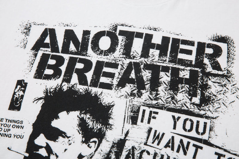Close-up of front print with bold “ANOTHER BREATH” text on white long sleeve tee
