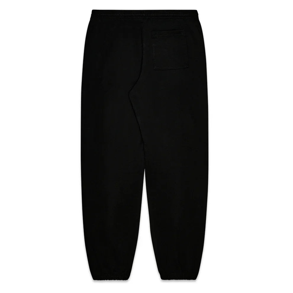 The Sp5der Sweatpants are unisex black cotton joggers with pink graphic logo and star print, elastic cuffs and waistband, a soft casual feel, and a single right patch pocket shown from the back.