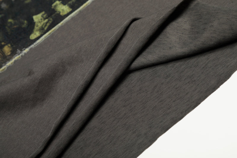 Close-up of layered sleeve opening on charcoal long sleeve tee