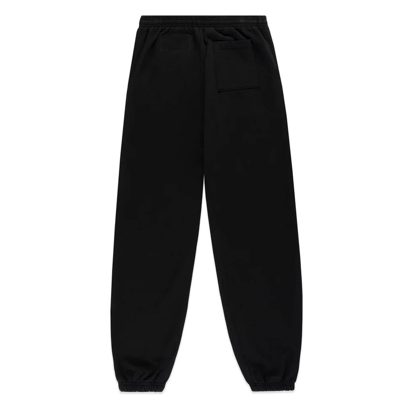 The Sp5der Sweatpants – Unisex Black Cotton Sweatpants feature a flame side logo, star print, elastic waistband and cuffs, a single right back pocket, and classic jogger style shown from the back.