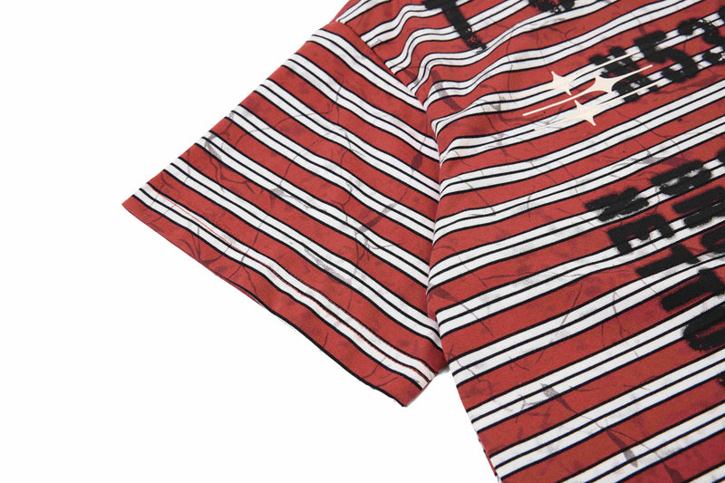 Red striped streetwear cotton T-shirt with graffiti-style black splatter and star accents on a white background