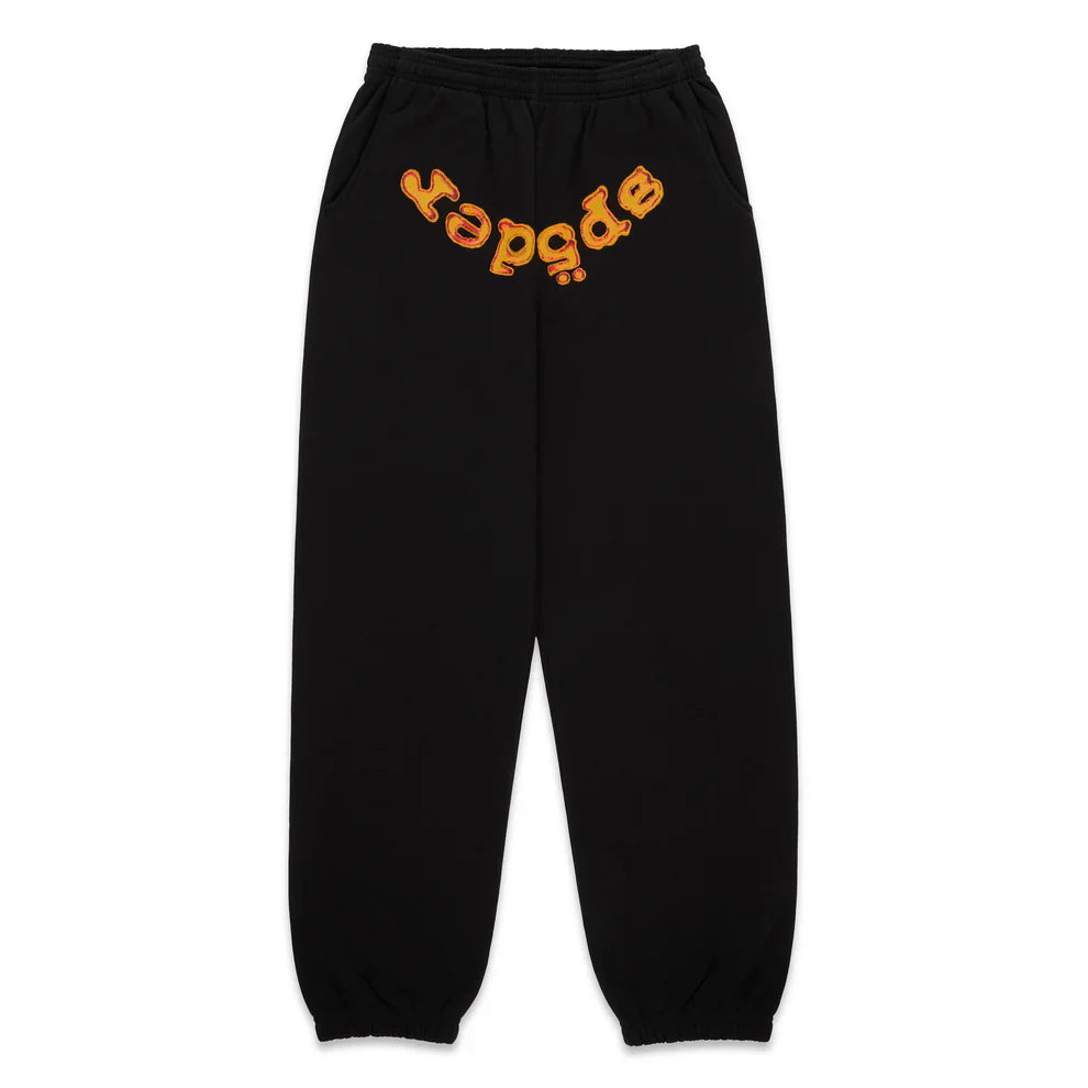 Unisex black cotton Sp5der Sweatpants feature a flame logo printed on the front—ideal for fans of bold streetwear styles and eye-catching Sp5der designs.