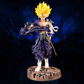 The Seakoff Future Trunks Super Saiyan Collectible Figure – Dragon Ball Z stands muscular at 28cm with spiky yellow hair, tattered dark purple clothing, and a sword pose on a textured circular base against a dark blue background.