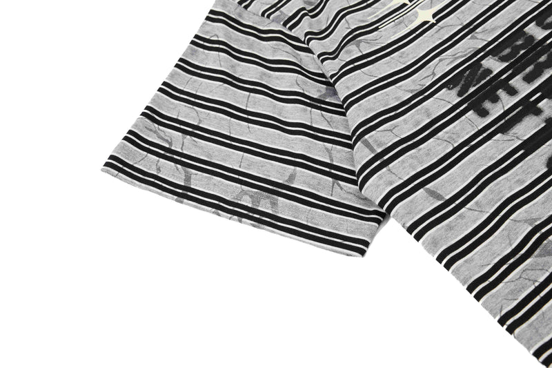Black and gray striped streetwear T-shirt with graffiti-style print and oversized cotton fabric