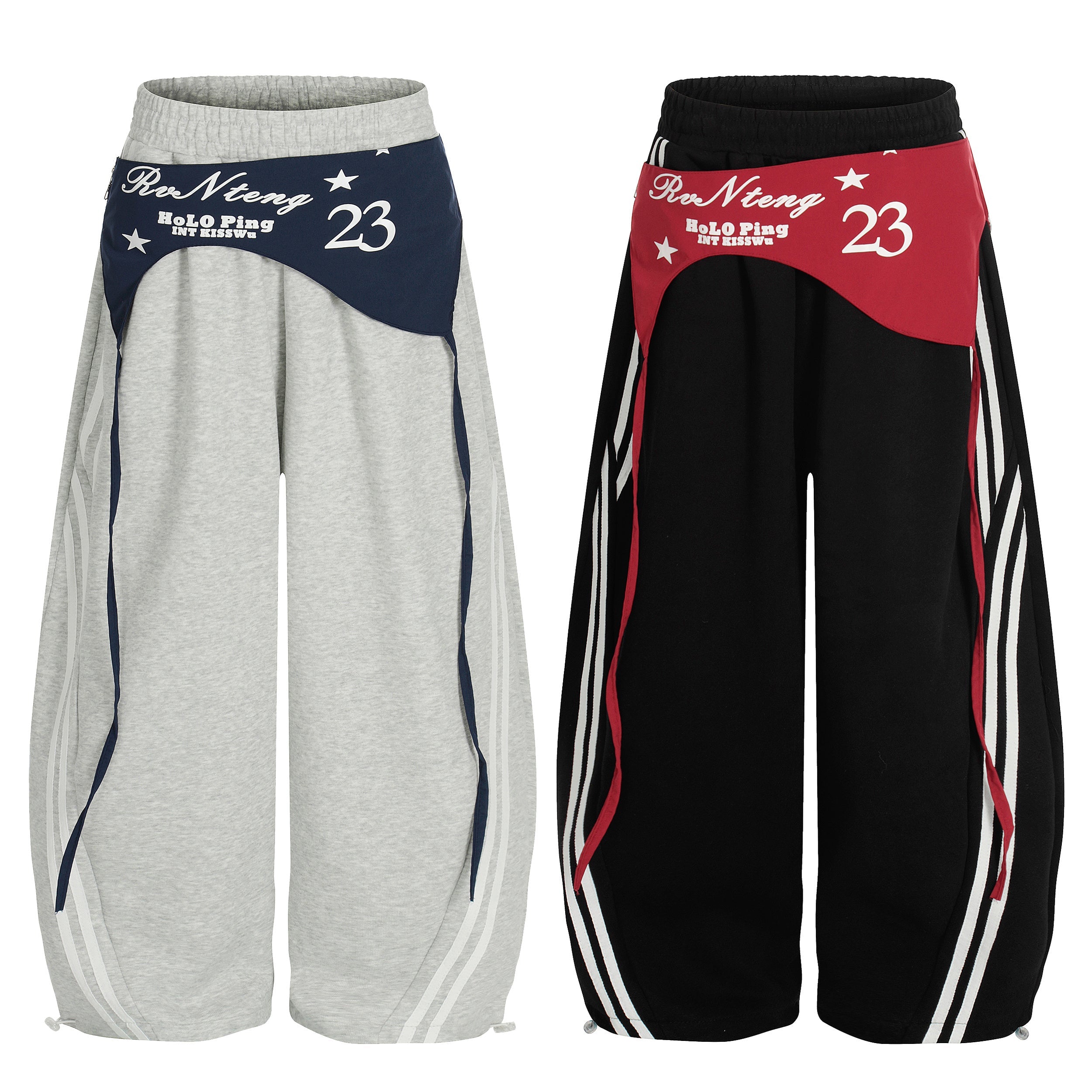 Front view of grey and black wide-leg track pants with double-waist contrast panels, varsity print, and triple stripe detaili