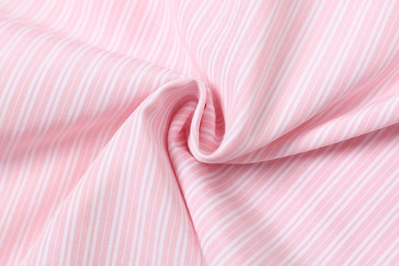 Close-up of pink striped fabric texture gathered in a swirl