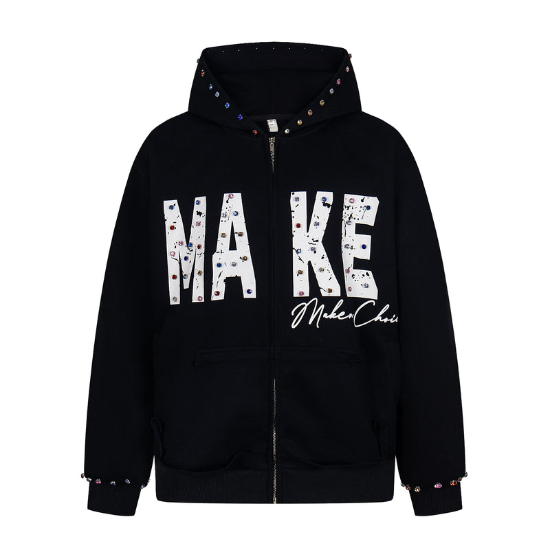 Black studded zip hoodie front view with white MAKE lettering and script text