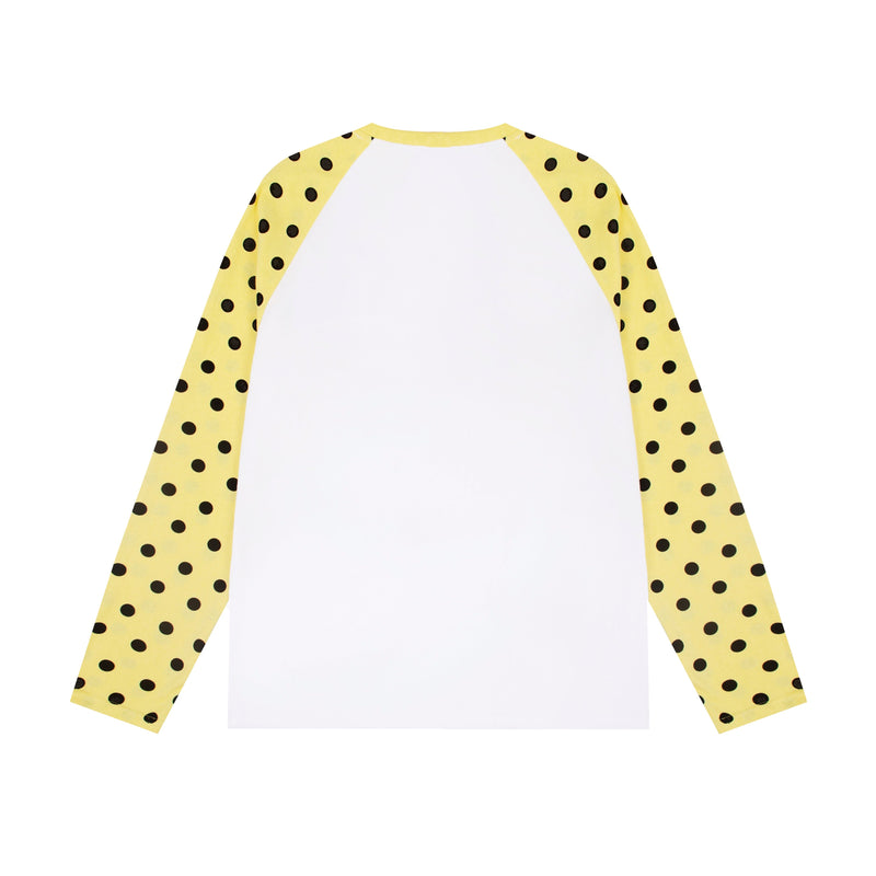 Back view of white raglan long sleeve tee with yellow polka dot sleeves