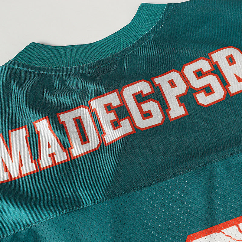Teal streetwear football jersey with crack-style white number print and ribbed collar detail