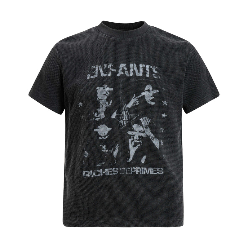 Black waffle knit graphic T-shirt with faded vintage band-style print and short sleeves on a white background