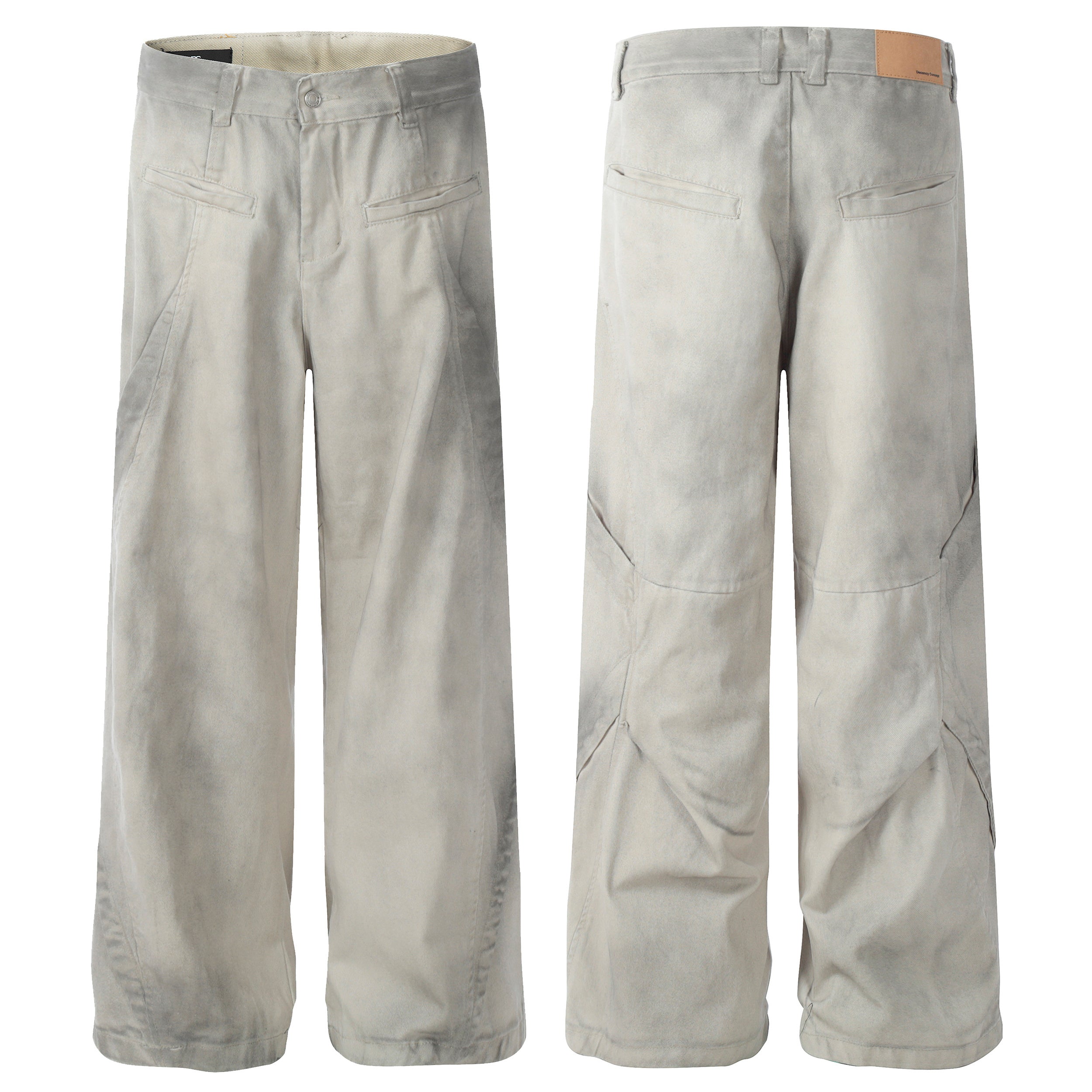 Front and back view of washed grey wide-leg utility pants with multi-panel construction and angled welt pockets