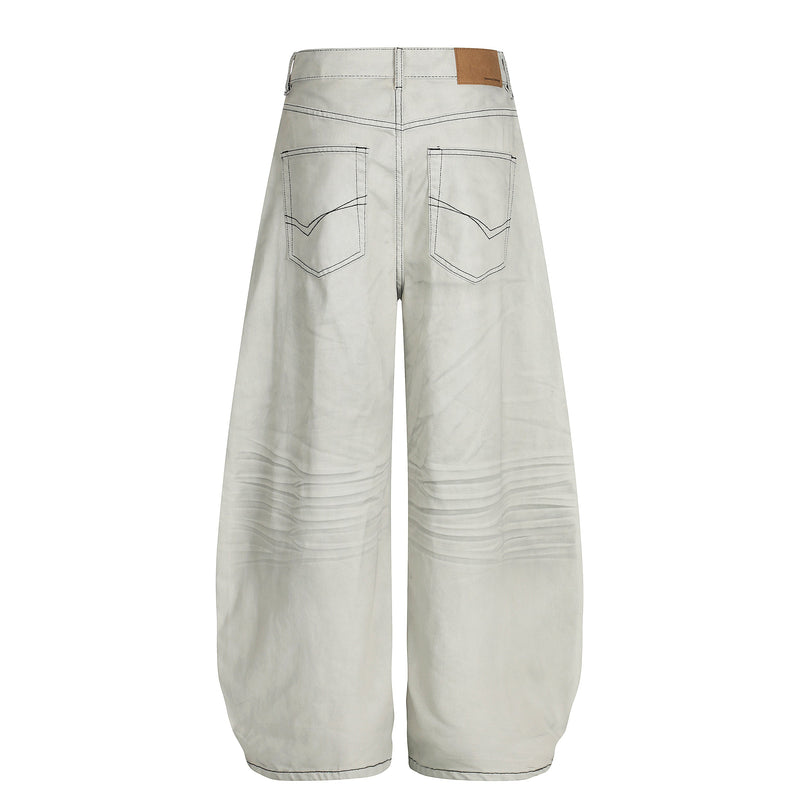 Back view of light gray ultra wide-leg jeans with contrast stitching and square back pockets