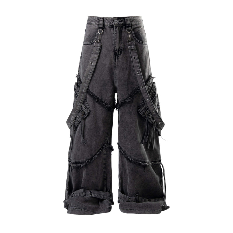 Washed black deconstructed cargo jeans with front strap details and frayed seams