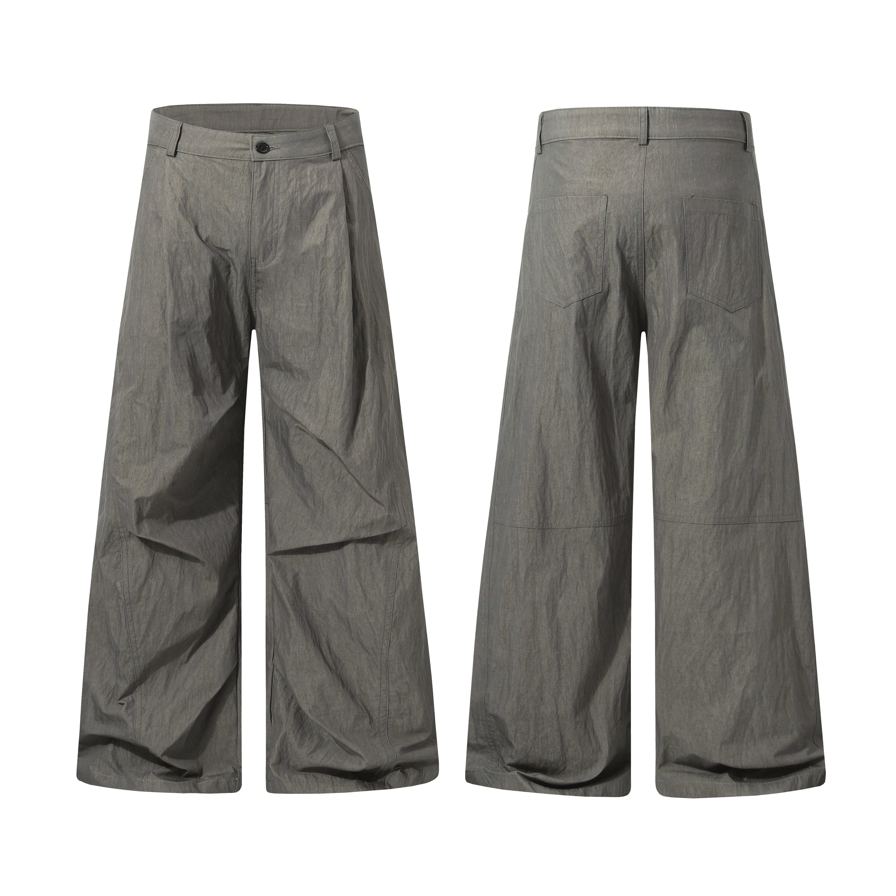 Front and back view of grey crinkled wide-leg nylon-cotton trousers with clean seam paneling and single back pocket