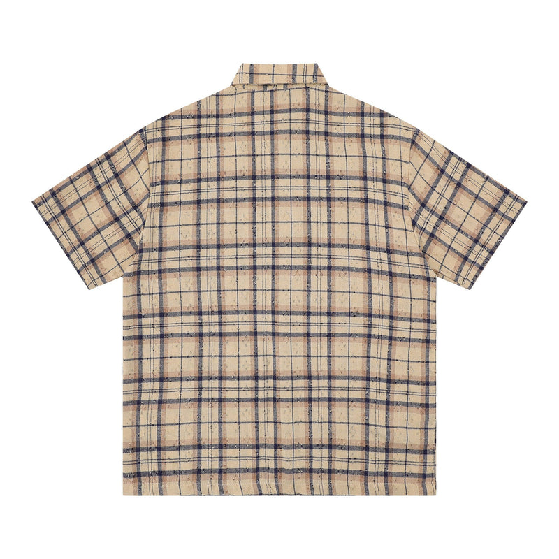 Beige plaid short sleeve button-up shirt with navy grid pattern, shown flat from the back