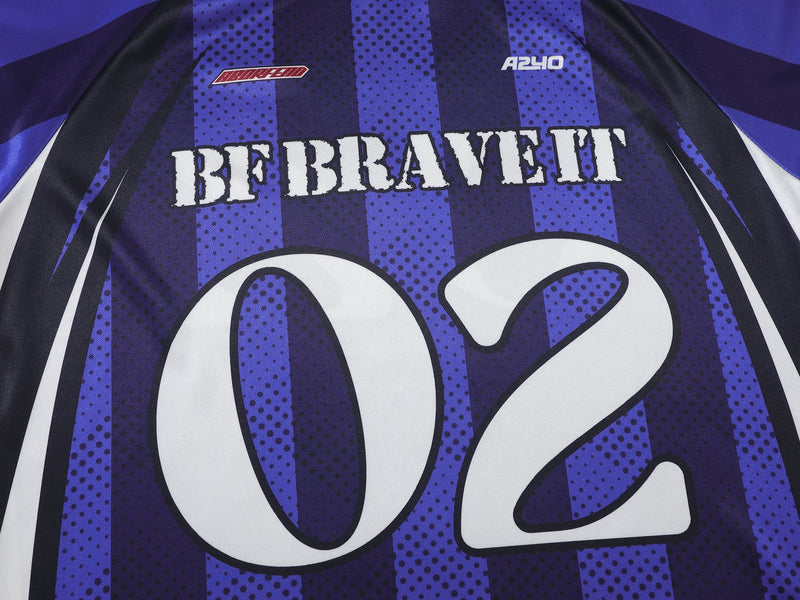 Close-up of blue jersey front with BF BRAVETT text and large 02 graphic