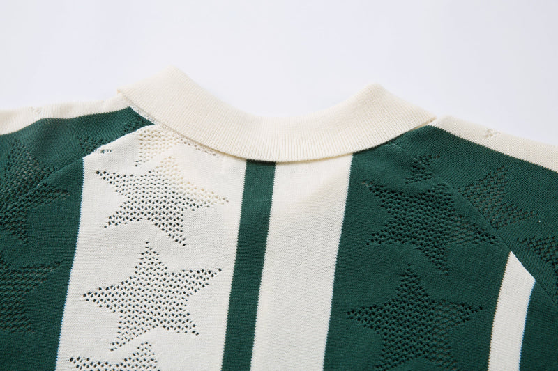 Close-up of the cream collar and green striped knit fabric with star jacquard texture
