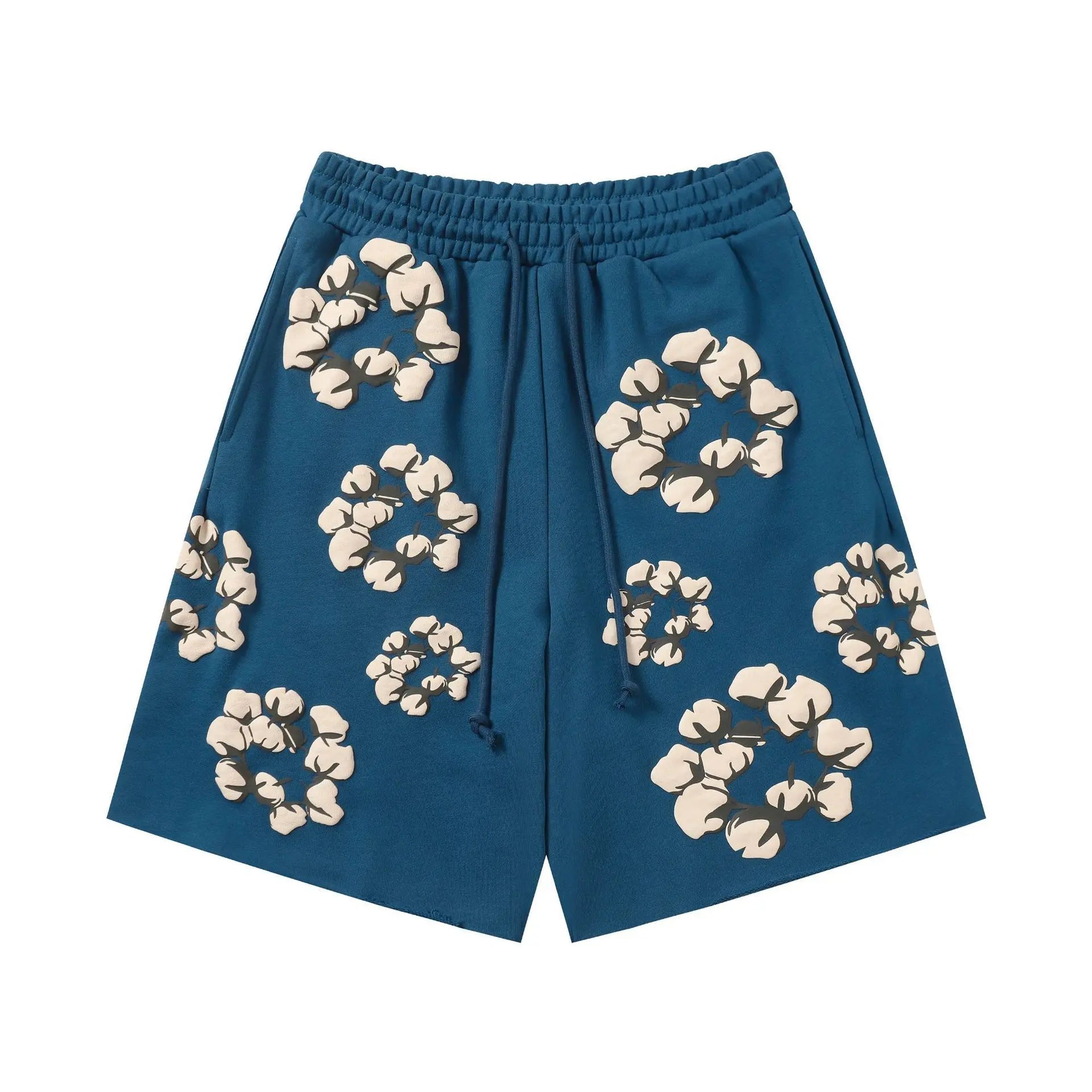 Blue cotton jogger shorts with allover cream cotton wreath print and drawstring waist