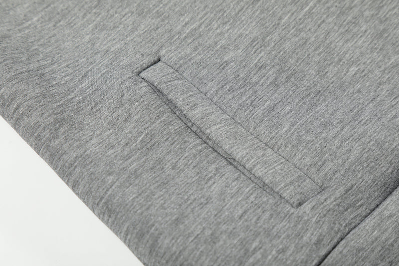 Close-up of grey hoodie pocket opening
