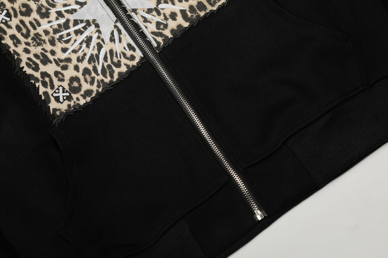 Front lower torso view of black zip-up hoodie with leopard chest panel