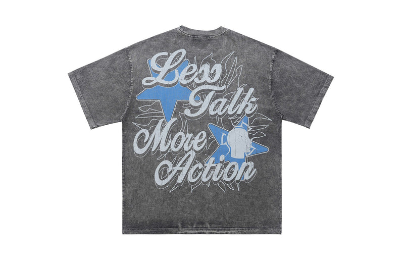 Vintage washed black graphic T-shirt with bold blue star accents and Walk the Talk slogan on the back