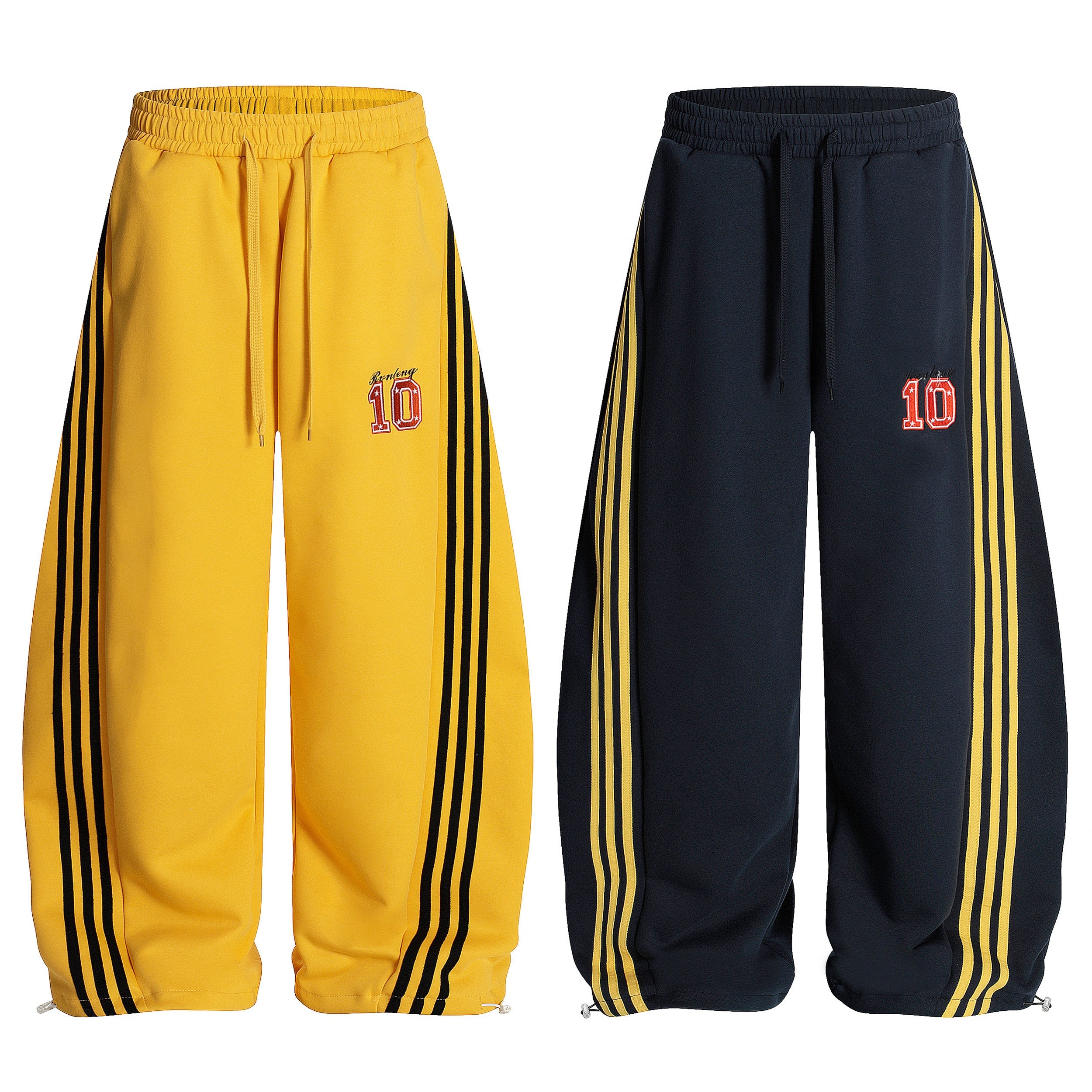 Yellow and navy wide-leg retro track pants with triple side stripes and embroidered number 10 varsity patch