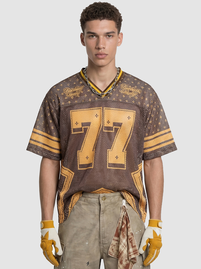 Brown mesh jersey T-shirt with gold star accents and large 77 graphic on the front