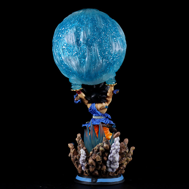 This Seakoff Goku Collectible Figure – Dragon Ball Z Kamehameha Statue features Goku in action with blue and orange attire, holding a translucent blue energy sphere above his head on a rocky base. Ideal for any Goku collectible enthusiast!.