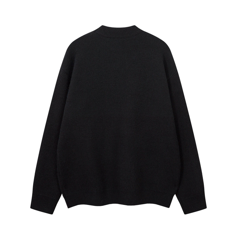 Black knit sweater front with ribbed trim and plain crew neck