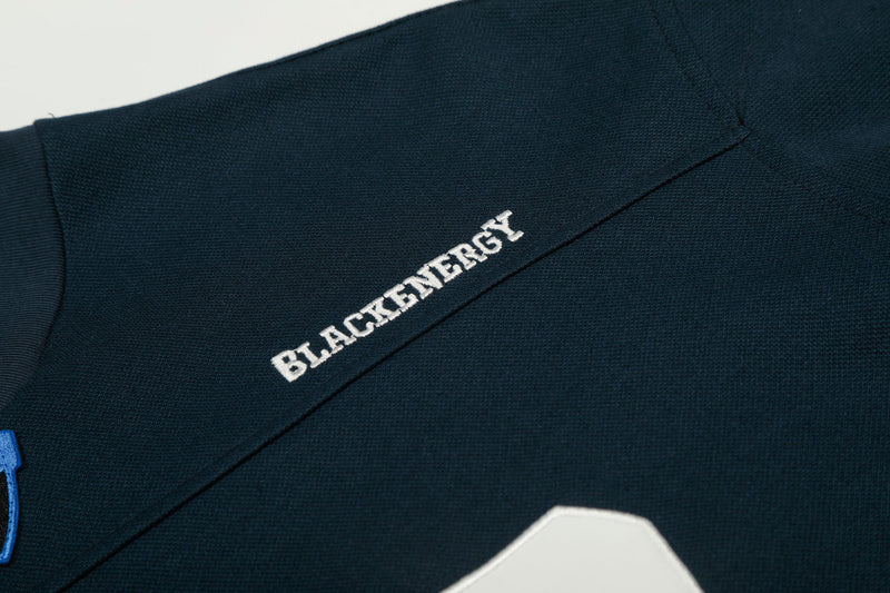 Close-up of navy tee shoulder with small embroidered Blackenergy text