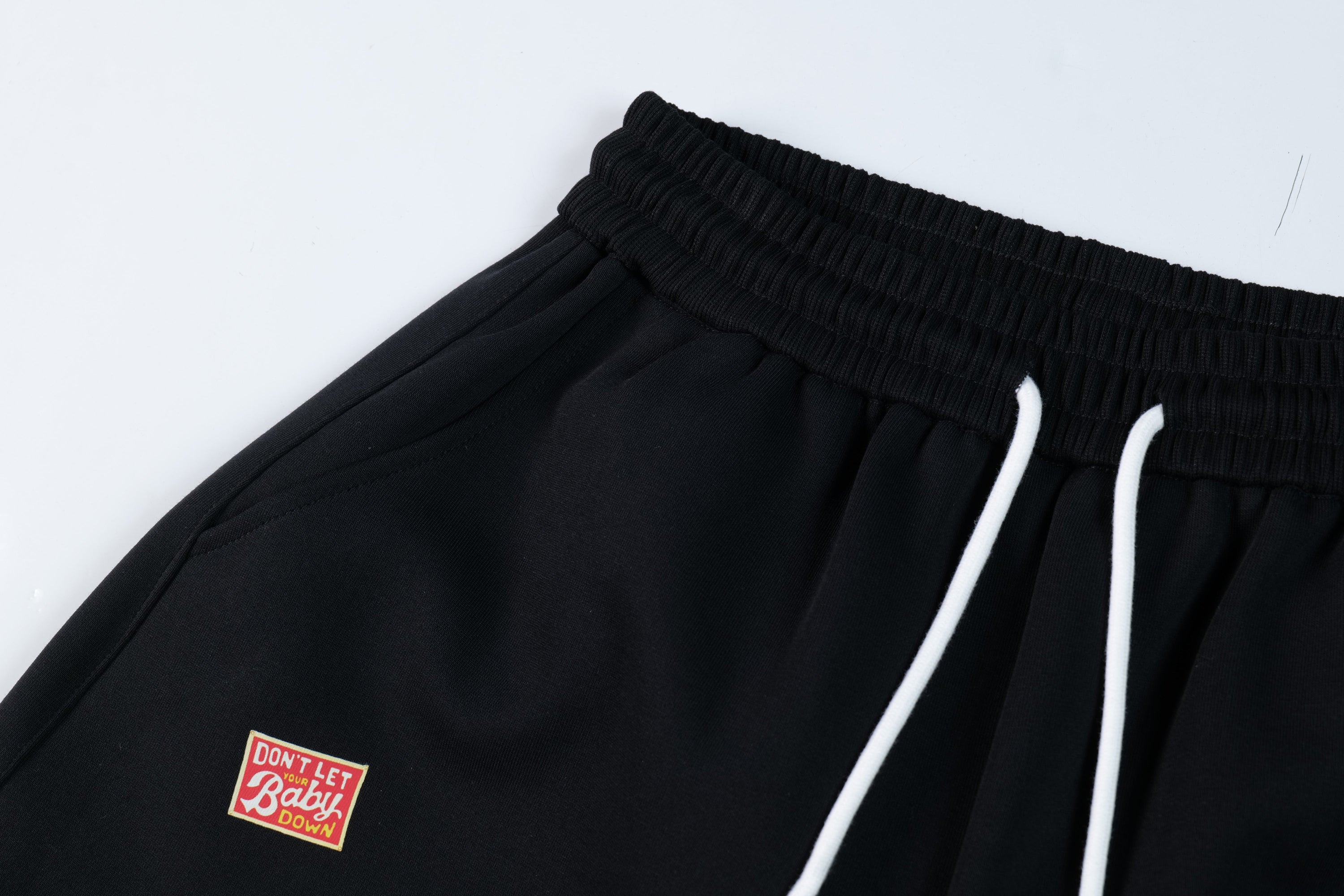 Omirad Patch Graphic Track Pants | Wide-Leg Streetwear