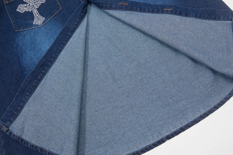 Dark wash denim button-up shirt with rhinestone cross detail on the chest and contrast light denim paneling